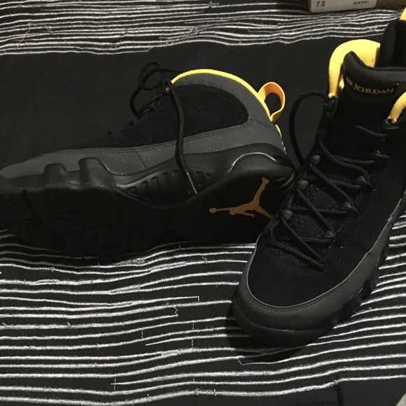 jordan 9s black yellow